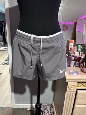 Nike Women's Light Gray Athletic Shorts with White Drawstring